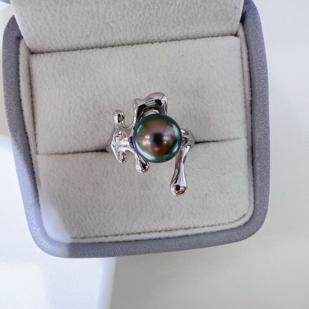 Liquid Lava Irregular Ring: Liquid Lava Irregular Ring Seiko Sterling Silver Inlaid 9-10mm Tahitian Black Pearl Freight: 1.International Freight: Foreign shipping charges are determined by destination. 2.Photos, descriptions and