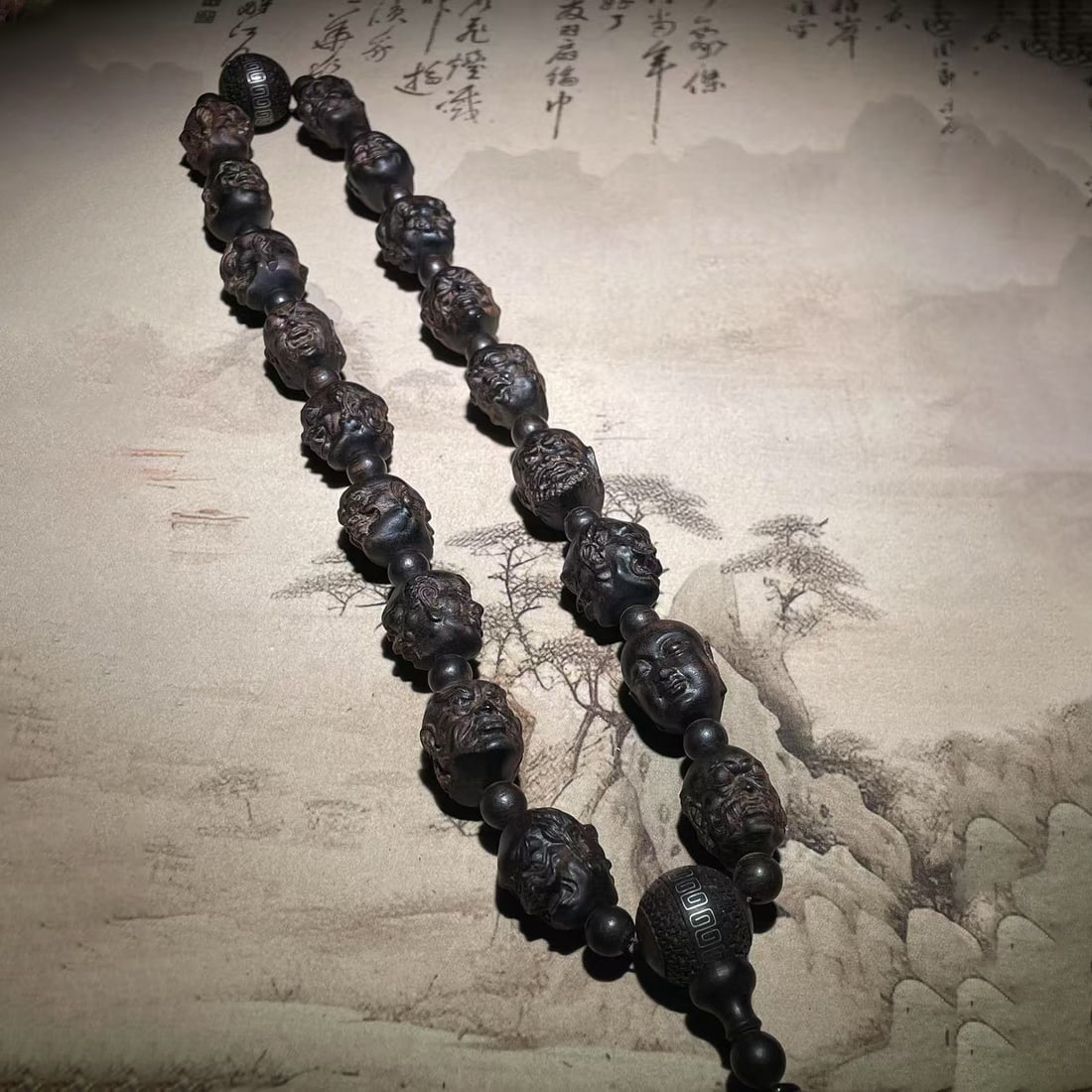 Old collection: old agarwood with eighteen arhats holding hands, a box of Buddha amulets (1 of 7)