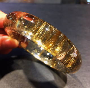 Titanium crystal bracelet: Titanium crystal bracelet. Crystal clear, beautiful color, uniform titanium wire, exquisite workmanship. Specifications: Inner diameter: 57 width 16 thickness 12 weight 91 grams Freight:1.Internationa