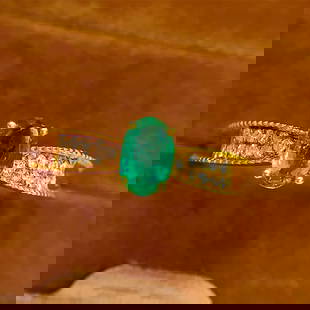 18k natural emerald ring: 18k natural emerald ring Total weight: 1.50 grams Main stone: 0.6 carats Diamonds: 18 Freight: 1.International Freight: Foreign shipping charges are determined by destination. 2.Photos, descriptions a