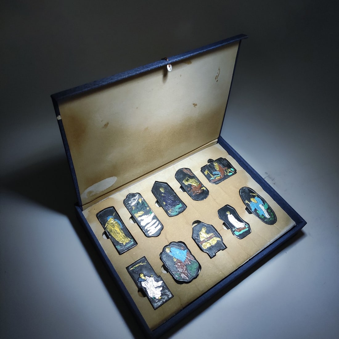 Ming Dynasty style ink sticks by Cheng Junfang set: A set of Ming dynasty style inkstones by Cheng Junfang, featuring ten eminent monks, with the signature of Da Ming Cheng Junfang. The set is well-preserved with colored paintings and gilded ink. Indiv