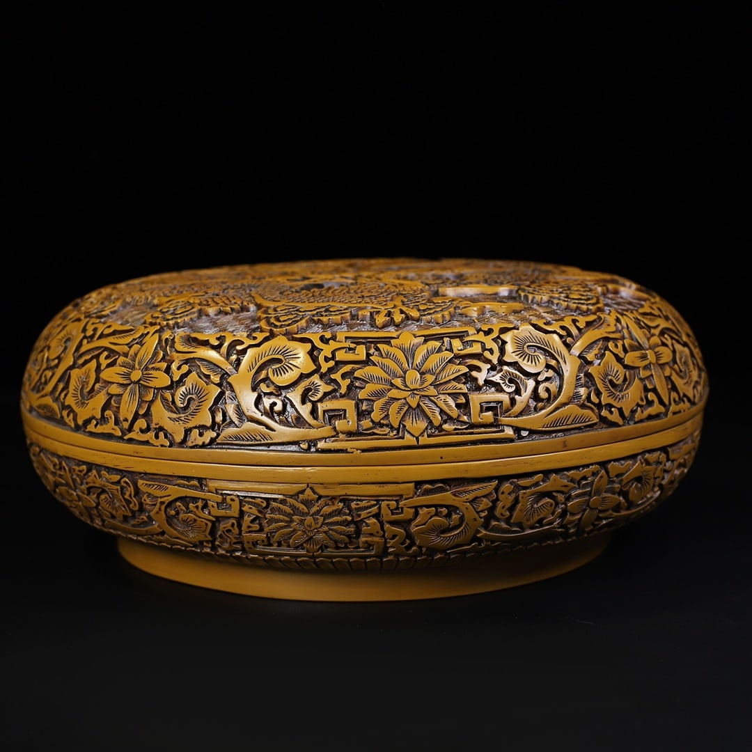 Lacquered Wood Box with Double Dragons Playing with the Pearl: A round lacquer box with a design of two dragons playing with a pearl, formerly in the collection. It measures 30.5 cm in diameter, 12 cm in height, and weighs 2780 grams. The box is crafted using the