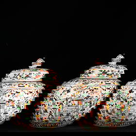 A pair of Ming-style five-colored 'Bai Zi Ying Xi' cloud dragon pattern covered jars: A pair of Ming-style polychrome covered jars with a design of 100 children playing among clouds and dragons, measuring 39 x 34.5 cm. The jars are made using polychrome techniques, with red, green, and