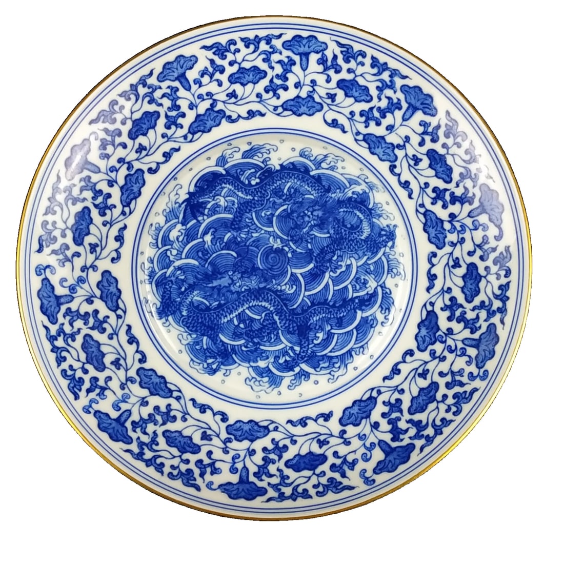 Qing Dynasty Blue and White Hand-painted Dragon Pattern Gilt Plate: This Qing Dynasty Yongzheng blue and white hand-painted dragon design gold-trimmed plate is characterized by its exquisite shape and elegant decoration. The plate features a graceful double dragon pla