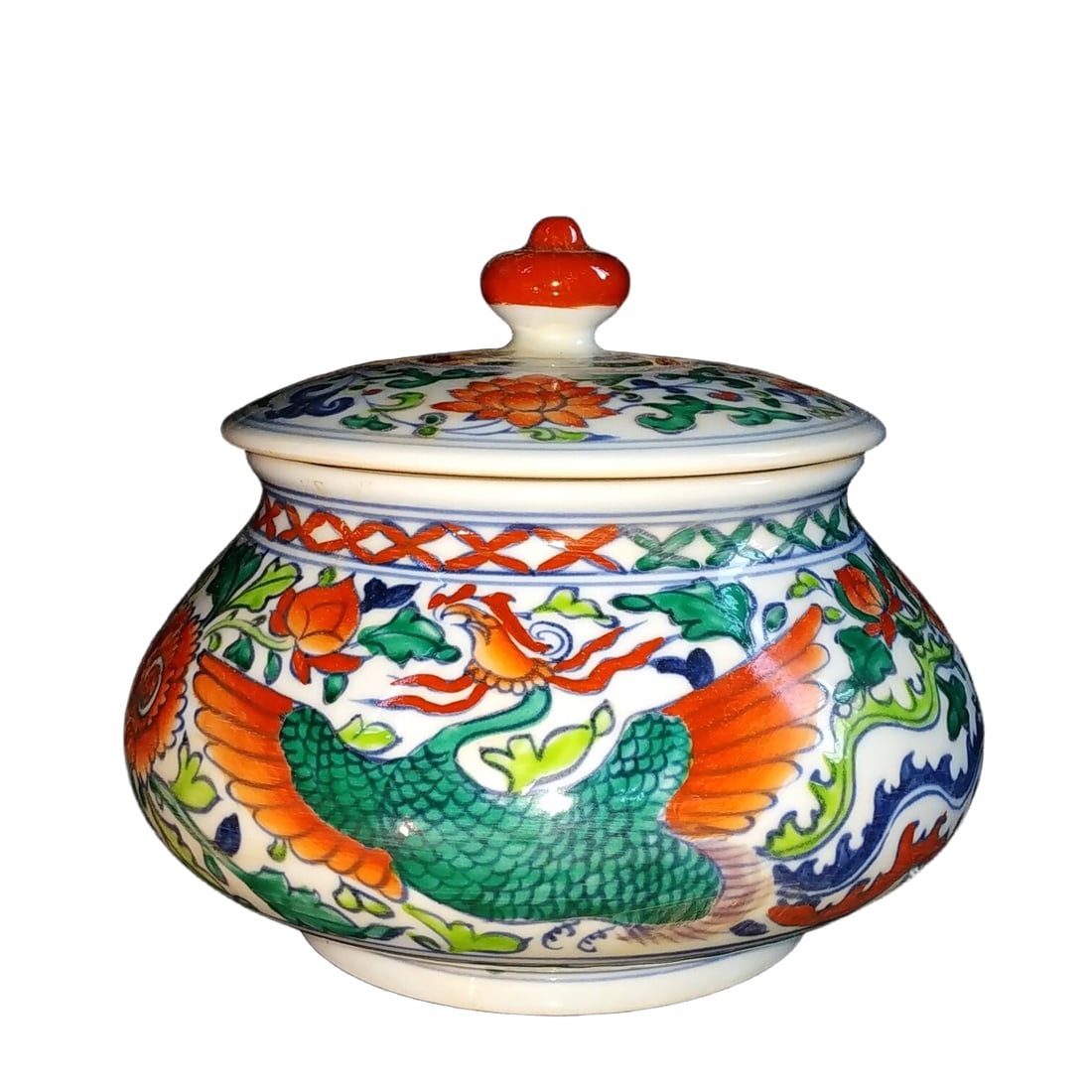 Ming Dynasty Wucai Hand-painted Phoenix Pattern Covered Jar: This is a five-colored hand-painted phoenix pattern covered jar in the style of the Ming Dynasty Xuande period. It is exquisitely preserved and features typical Ming dynasty vessel characteristics. Th
