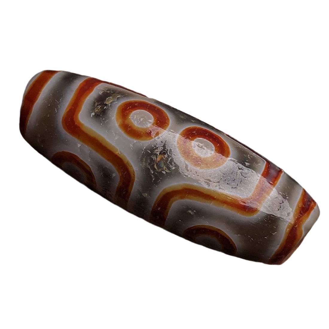 Seven-Eyed Dzi Bead: Old Material High Oil Beaded Agate [Seven-eyed Celestial]Size: 39*14 millimeters Weight: 12.6 grams Seven-eyed Celestial Completes all aspects of luck, fame, career, wealth, health, longevity, and mar