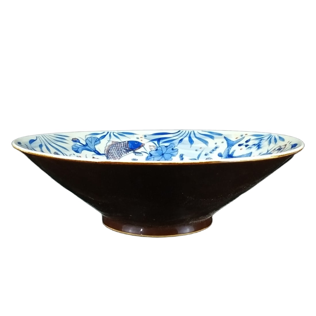 Kangxi Blue and White Porcelain with Underglaze Red Hand-painted Fish and Grass Pattern Douli Bowl: This Qing Kangxi blue and white porcelain bowl with underglaze red decoration showcases the superb craftsmanship of the Kangxi period with its unique shape and exquisite designs. The bowl is shaped li