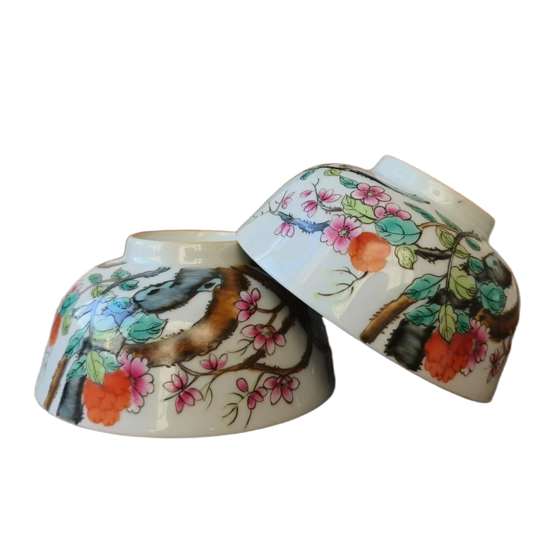 Pair of Qing Dynasty Hand-painted Famille Rose Plum Blossom Bowls: A pair of Qing dynasty hand-painted pastel pink plum blossom bowls, with fine craftsmanship, whole, 6 cm in height, 12 cm in diameter. Freight: 1.International Freight: Foreign shipping charges are