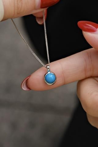 Platinum Turquoise Pendant: Turquoise Pendant - High Blue Turquoise from Sleeping Beauty, Round and Simple yet Elegant Design 1.International Freight: Foreign shipping charges are determined by destination. 2.Photos, description