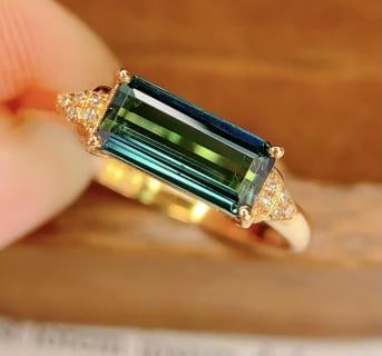 18K Gold Tourmaline Ring: Total weight: 1.68 grams 00012110Main stone: 1.2 caratsDiamonds: 10 pieces 1.International Freight: Foreign shipping charges are determined by destination. 2.Photos, descriptions and valuations have