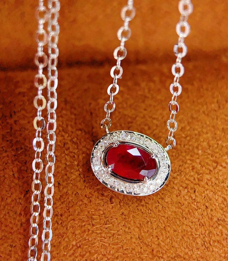 18K Gold Ruby Clavicle Necklace: Total Weight: 1.23 grams 241127096Main Stone: 0.4 caratsDiamonds: 25 pieces 1.International Freight: Foreign shipping charges are determined by destination. 2.Photos, descriptions and valuations have