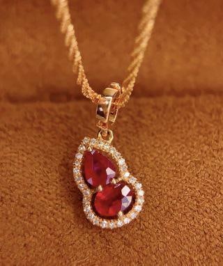 18K Gold 5 Carat Ruby Pendant: 18k Natural Ruby Versatile Clasp Pendant (Chain Not Included) 250218079Main Stone: 5 caratsDiamonds: 30 1.International Freight: Foreign shipping charges are determined by destination. 2.Photos,