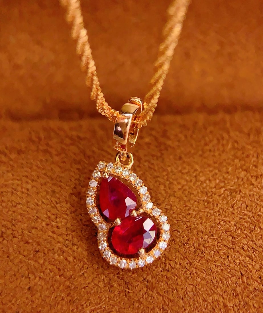 18K Gold 5 Carat Ruby Pendant: 18k Natural Ruby Versatile Clasp Pendant (Chain Not Included) 250218079Main Stone: 5 caratsDiamonds: 30 1.International Freight: Foreign shipping charges are determined by destination. 2.Photos, descr