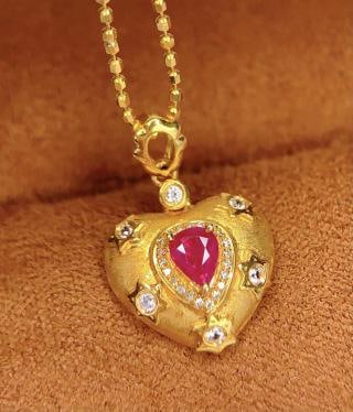 18K Gold Natural Ruby Pendant: 18k Natural Ruby Pendant (Chain Not Included) 241201025Total weight: 1.57 gramsMain stone: 0.4 caratDiamonds: 21 piecesWhite and blue sapphires: 6 pieces 1.International Freight: Foreign shipping