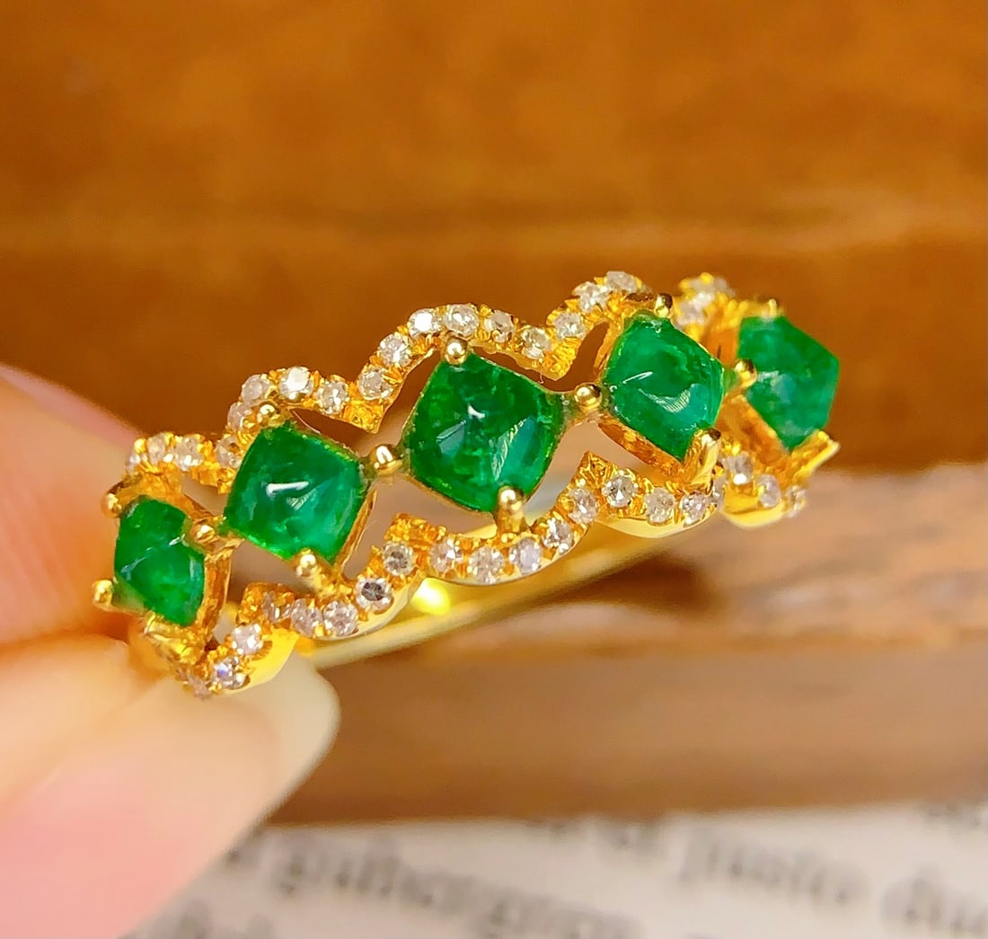 18K Gold Emerald Ring: 18k Natural Emerald RingTotal Weight: 2.41 grams 00022116Main Stone: 1.4 caratsDiamonds: 51 pieces 1.International Freight: Foreign shipping charges are determined by destination. 2.Photos, descriptio
