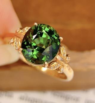 18K Gold Tourmaline Ring: 18k Natural Tourmaline RingTotal Weight: 2.63 grams 00012246Main Stone: 3.18 caratsDiamonds: 20 pieces 1.International Freight: Foreign shipping charges are determined by destination. 2.Photos,