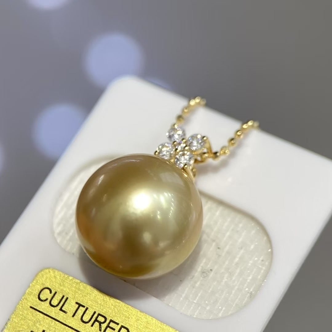 18K Gold South Sea Golden Pearl Pendant: 12-13mm perfectly round and extremely lustrous, almost flawless, natural deep golden color, South Sea golden pearl, full-bodied and vibrant in color 1.International Freight: Foreign shipping charges a