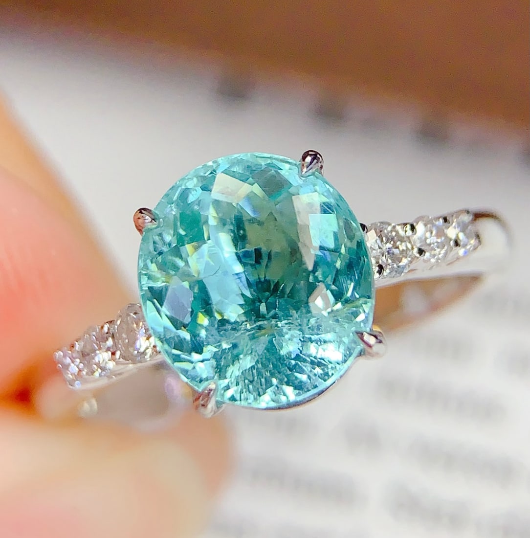18K Gold Natural Paraiba Ring: 18K Gold Natural Paraiba Ring Total Weight: 4.23 gramsMain Stone: 2.61 caratsDiamonds: 6 1.International Freight: Foreign shipping charges are determined by destination. 2.Photos, descriptions and val