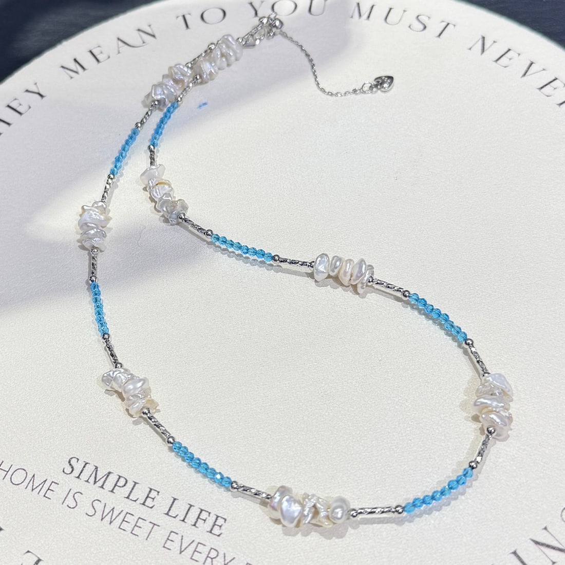 14K Gold Natural Baroque Freshwater Pearl Necklace: Natural baroque freshwater pearls with irregular shapes, paired with 3mm blue sapphires, designed with a 14k gold-plated starry sky motif, one of a kind. 1.International Freight: Foreign shipping char