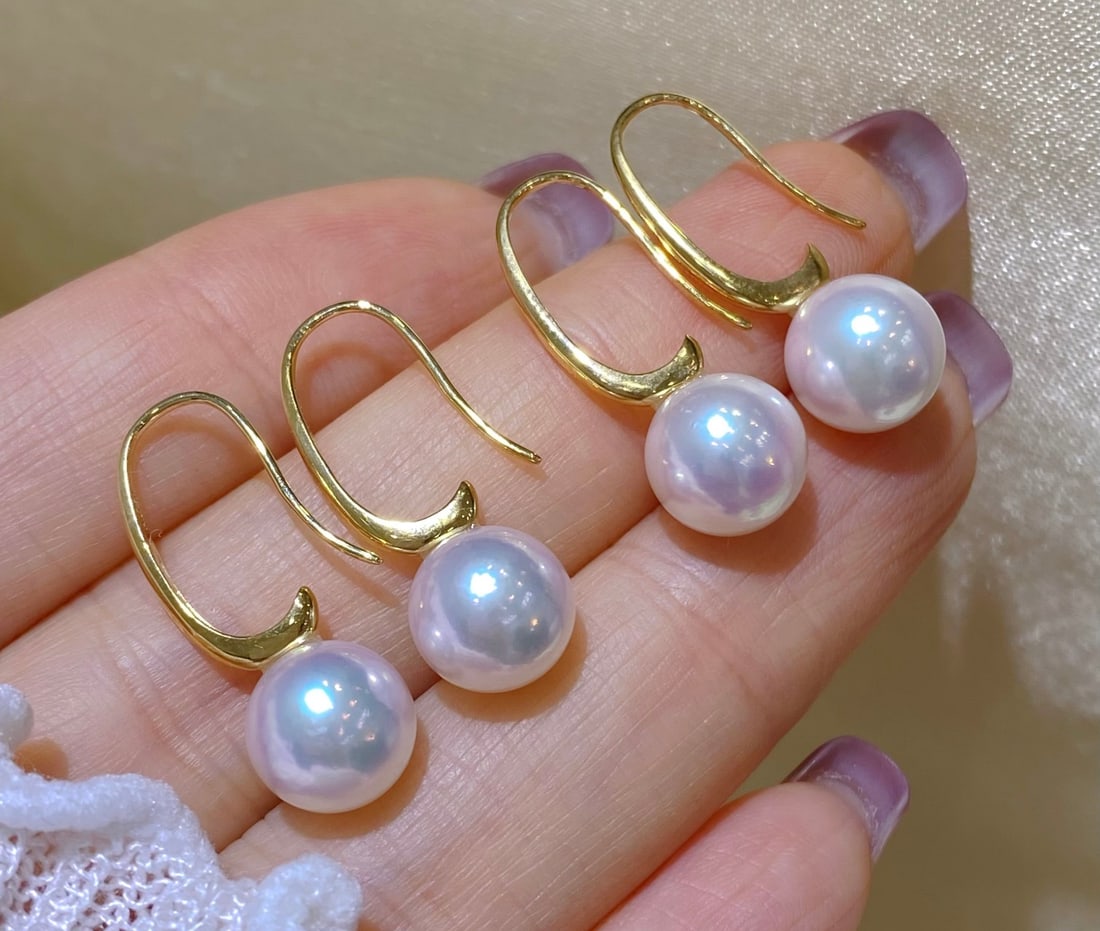 18K Gold Pearl Earrings: G18k gold earrings, a very unique design, thick gold and pearl combination with 8~9MM polar light cherry blossom pink 1.International Freight: Foreign shipping charges are determined by destination. 2