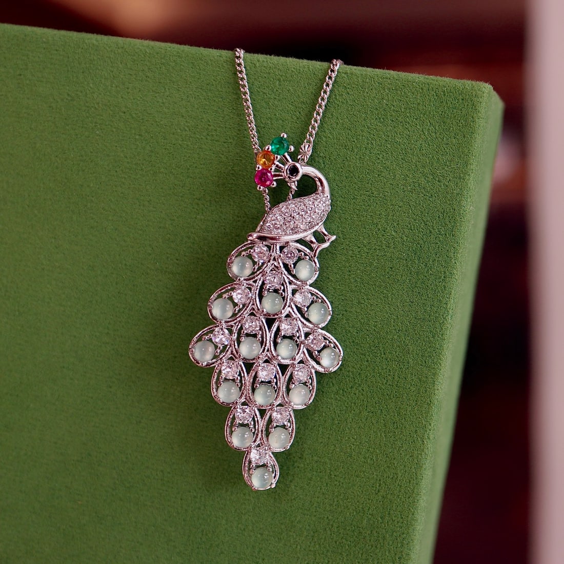 White Icy Jadeite Peacock Pendant Brooch: White Ice Jade Peacock Pendant Brooch Natural Jade Peacock Pendant Brooch Approx. 50*21mm Versatile Design White Ice Jade, elegant and luxurious, the gem that sparkles with brilliance. The winter sun'