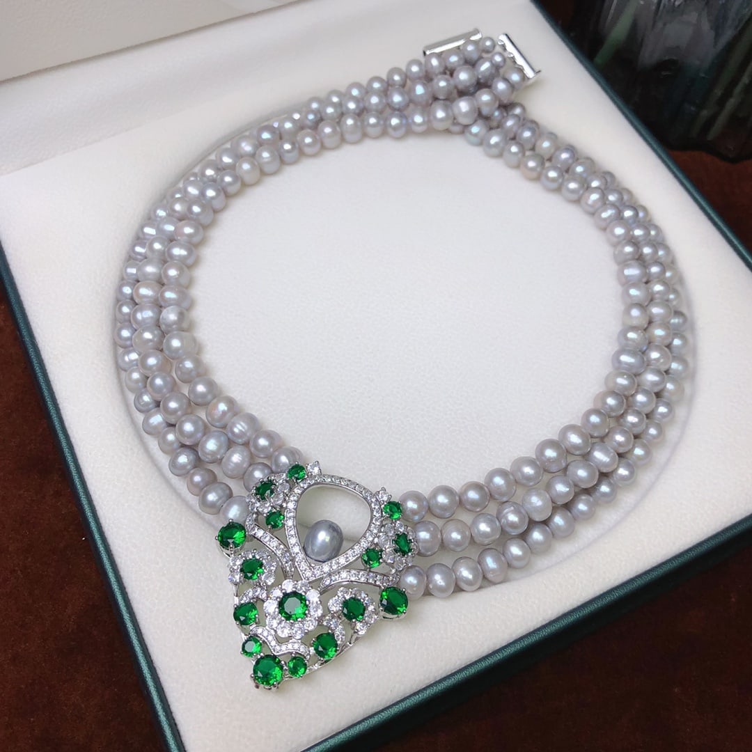 Pearl Necklace: New multilayered pearl necklace! The 'xl730' natural pearl necklace, a must-have for fashion enthusiasts, featuring elegant grey pearls of about 7-8mm, near-round with slight blemishes, paired with em