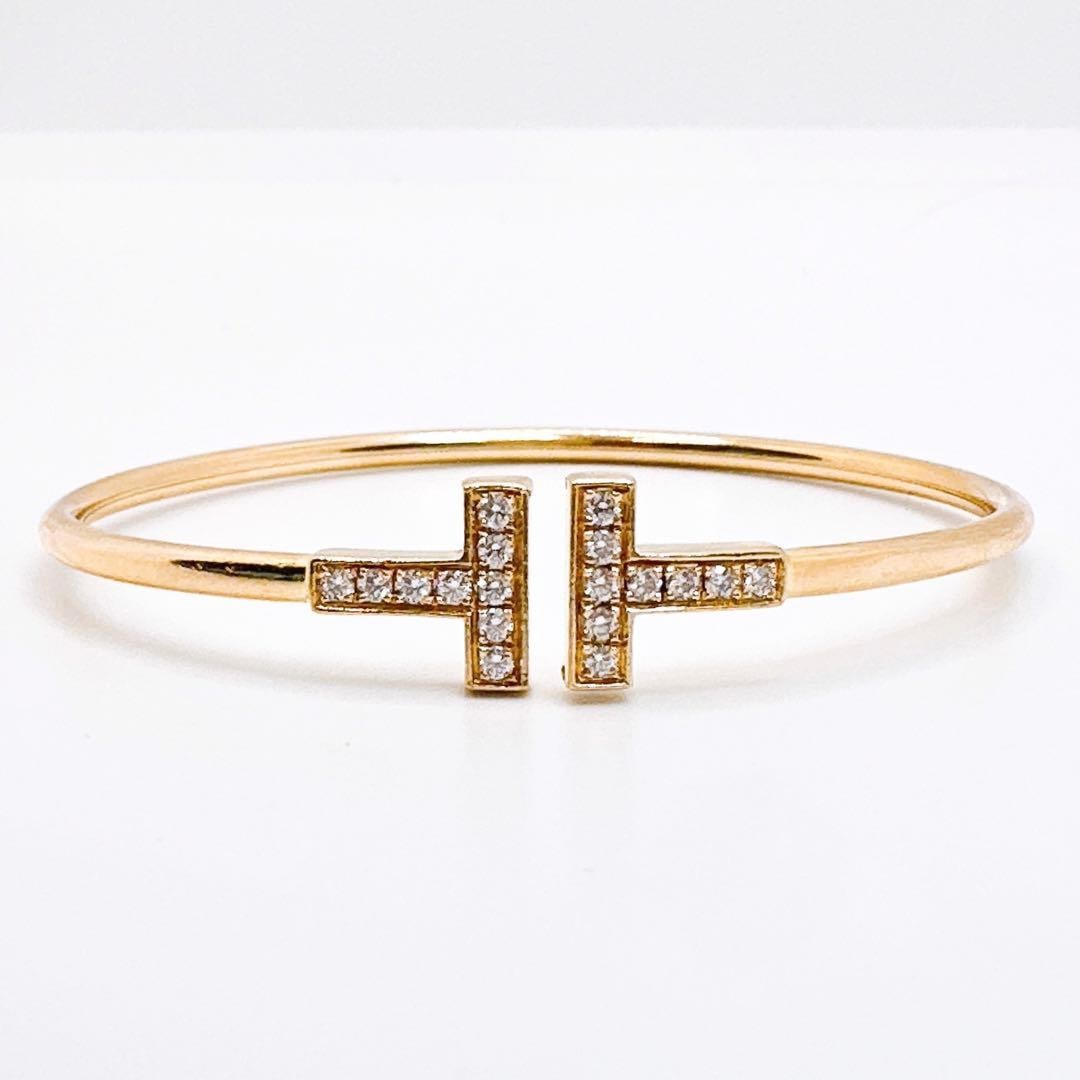 Second-hand Tiffany & Co. T Diamond Line Bracelet: Tiffany & Co. T Diamond Line Bracelet PGThis bracelet features Tiffany's iconic 'T' design, adorned with diamonds, adding a touch of brilliant sparkle to your wrist. It is the perfect choice for every