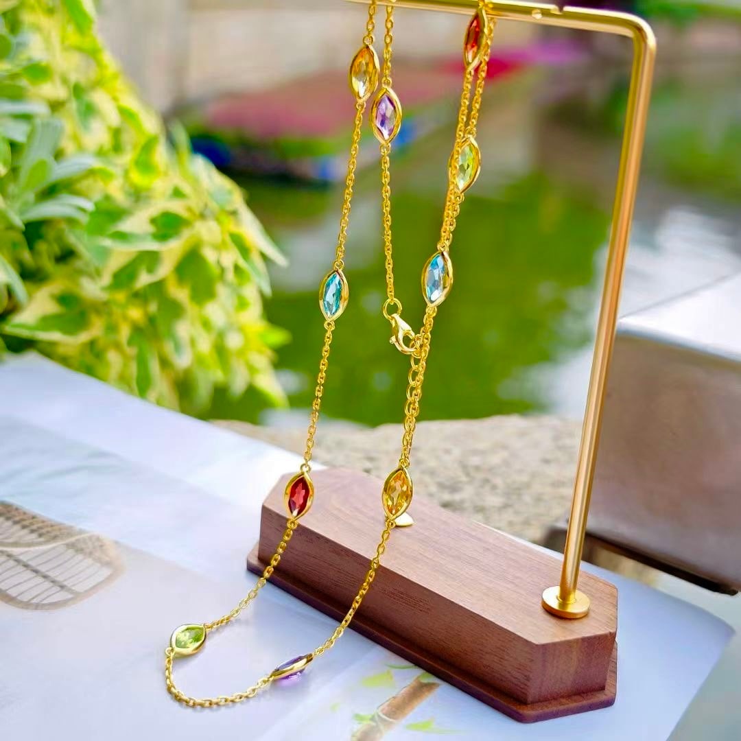 925 Silver Natural Gemstone Crystal Necklace: This necklace is set with 925 silver and features a 48mm natural multi-color crystal as the main stone, including topaz, amethyst, citrine, peridot, and garnet. Freight: 1.International Freight: Forei