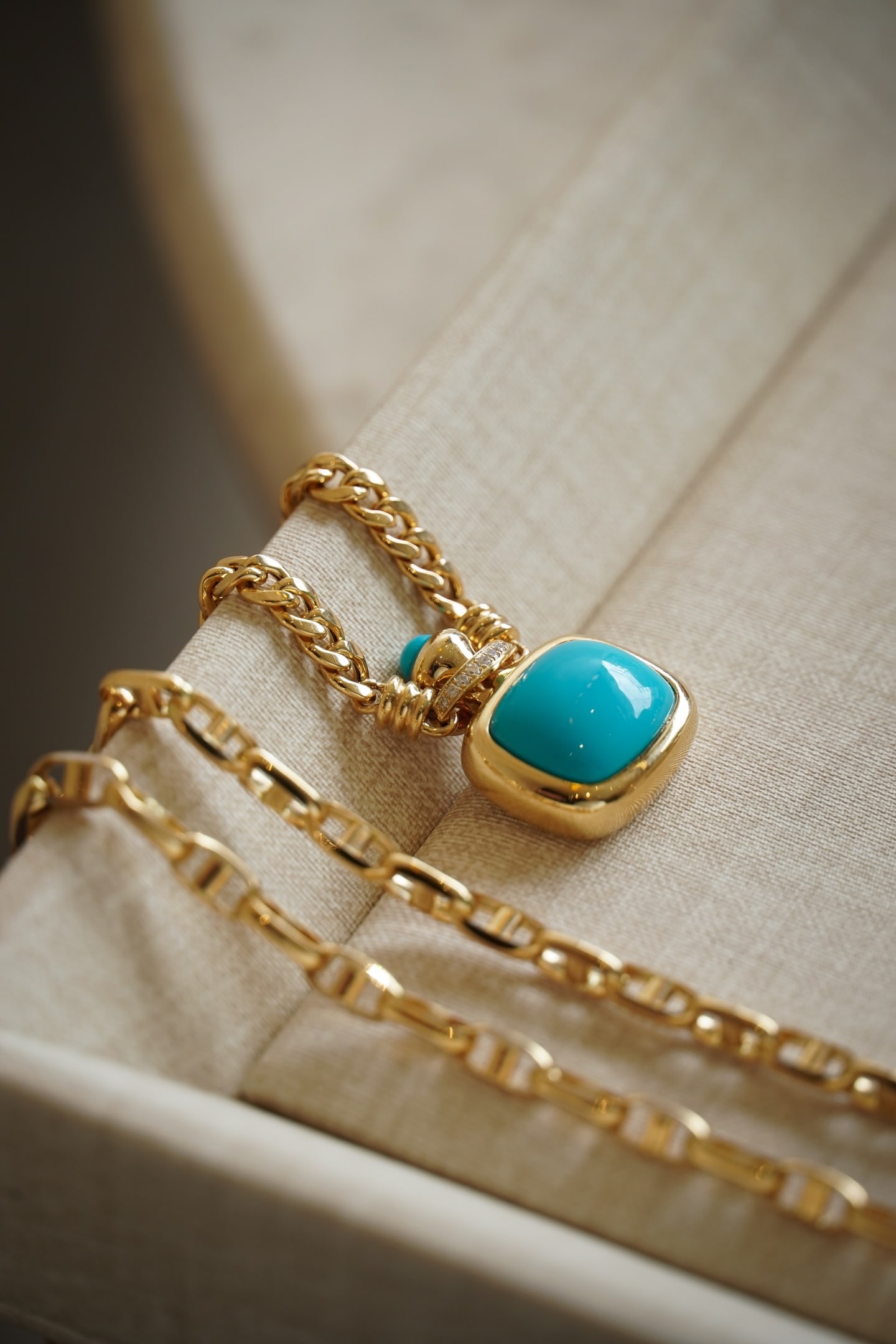 Sleeping Beauty Turquoise Perfume Bottle Italian Necklace: This necklace features a perfume bottle designed as a pendant, with a diamond set on top, and a pine nut used as the bottle cap. Paired with an Italian thick chain, it showcases a casual and retro vib