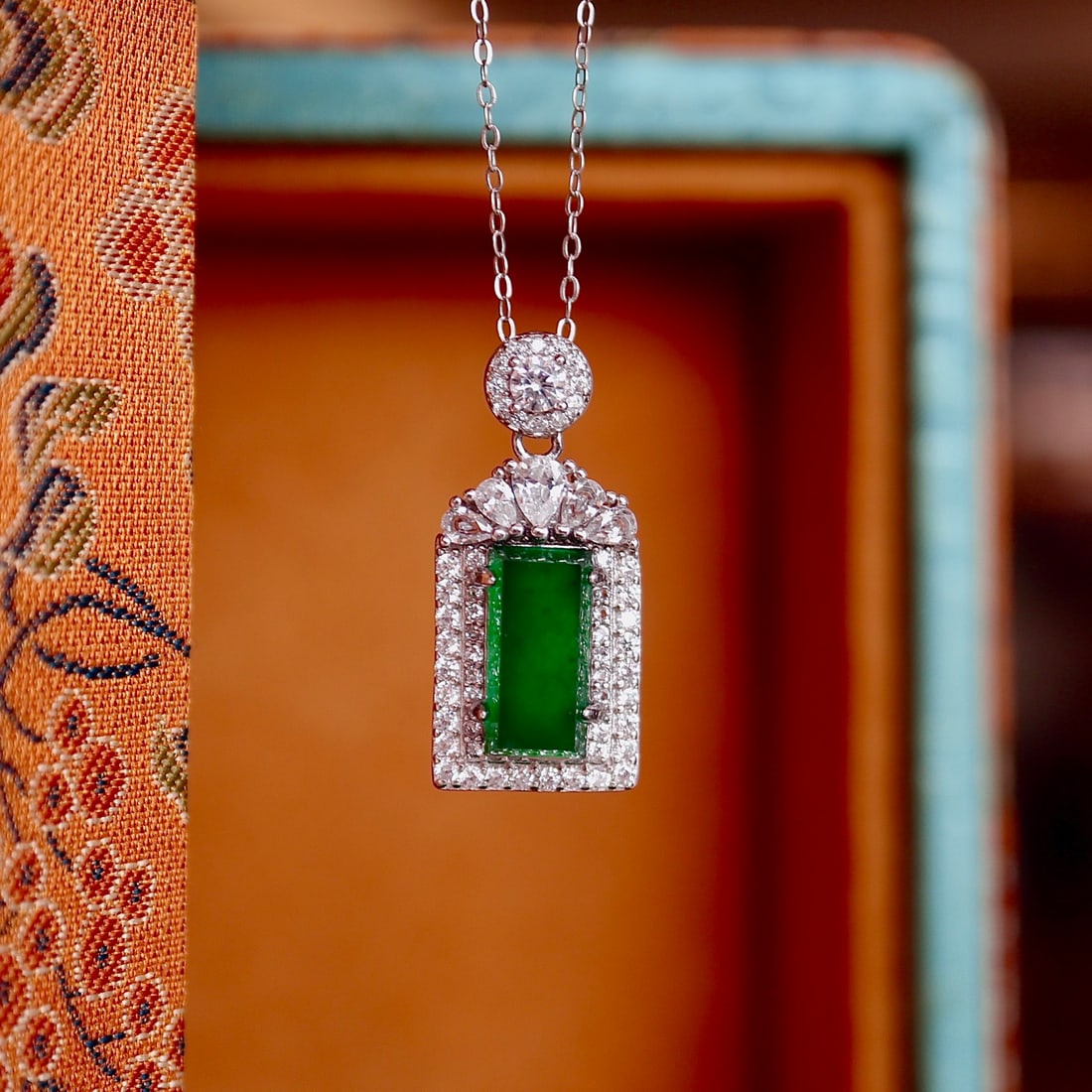 S925 Silver Natural Jadeite Pendant: This pendant is a stunning piece that captures the eternal charm of natural jade. It is exquisitely set in S925 sterling silver, emitting an elegant and delicate aura. The ice yang green hue of the ja