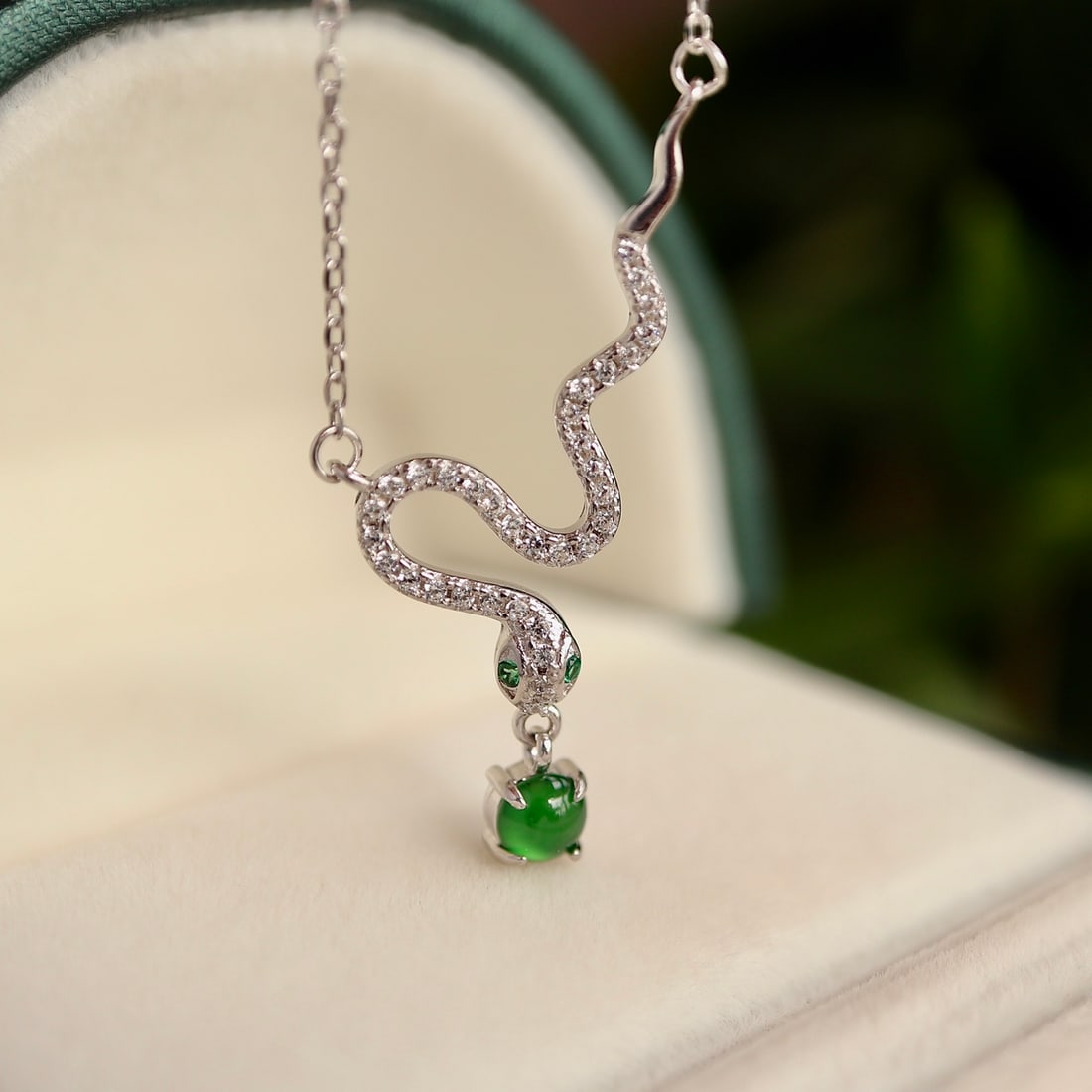 S925 Silver Natural Jade Snake Necklace: This exquisite necklace captures the elegance and charm of a snake, using natural jade and set in S925 sterling silver. The design is both elegant and symbolic, especially auspicious in the Year of th