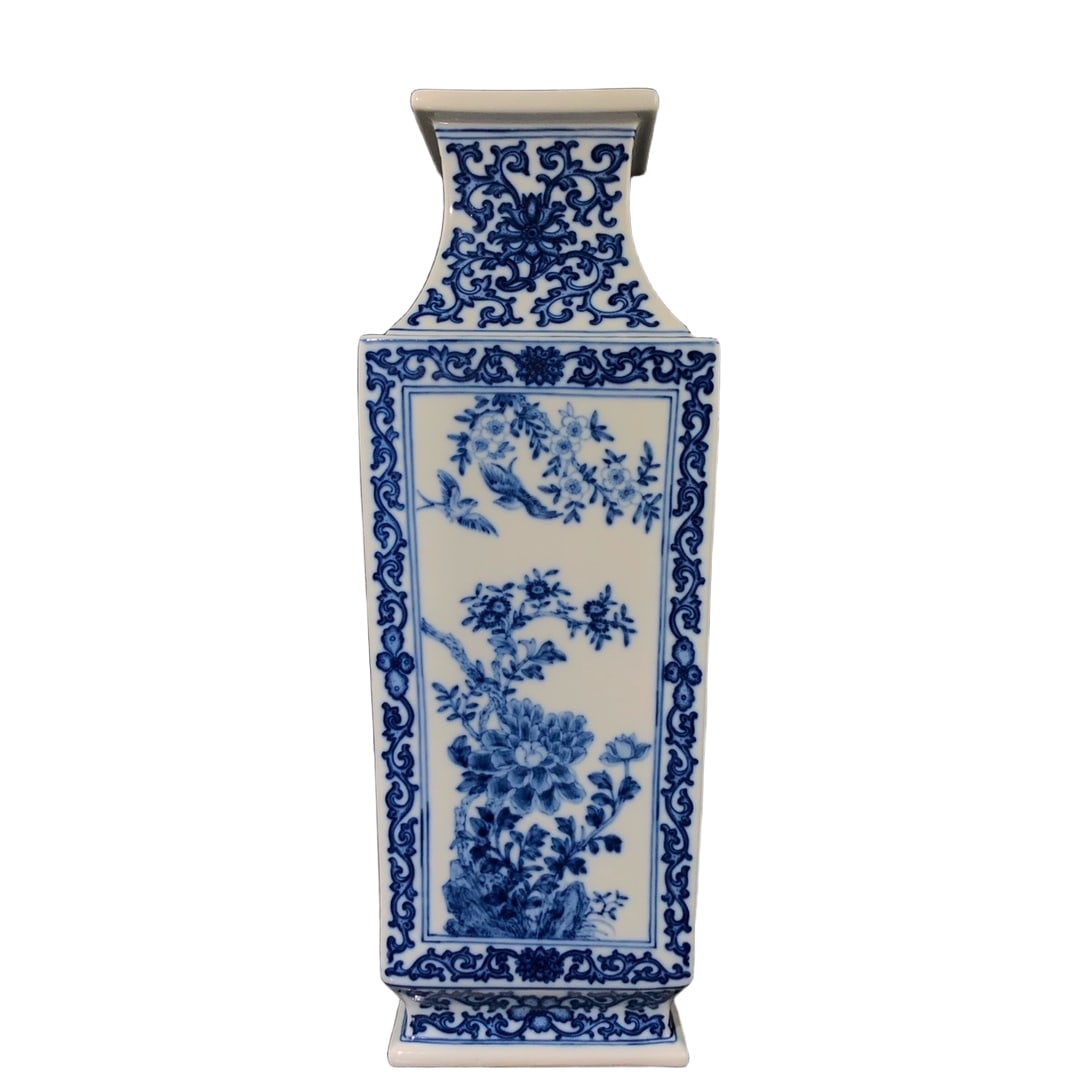 Qianlong Blue and White Square Vase with Flowers and Birds: Qianlong Blue and White Flower and Bird Square Zun Bottle, with regular shape, regular appearance, fine painting workmanship, mature patina, well-preserved, height 42 cm, width 15.5 cm Freight: 1.Inte