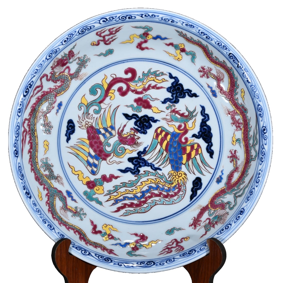 Ming Xuande Blue and White Polychrome Phoenix Plate: Ming Dynasty Xuande blue and white five-color phoenix pattern plate, 6.5 cm in height, 41 cm in diameter. This plate showcases the brilliant craftsmanship of Ming Dynasty porcelain, with a colorful su
