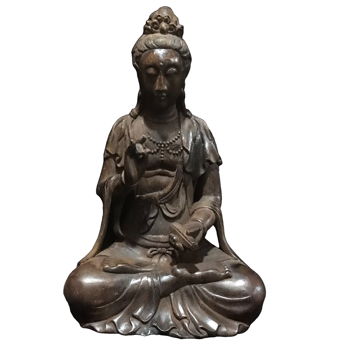 Qing Dynasty Old Agarwood Guanyin Statue: Qing Dynasty antique carved sandalwood statue of Guanyin, measuring 29.5 cm in height, 18.5 cm in width, 17 cm in length, and weighing 606 grams. It is carved from precious old sandalwood with clear