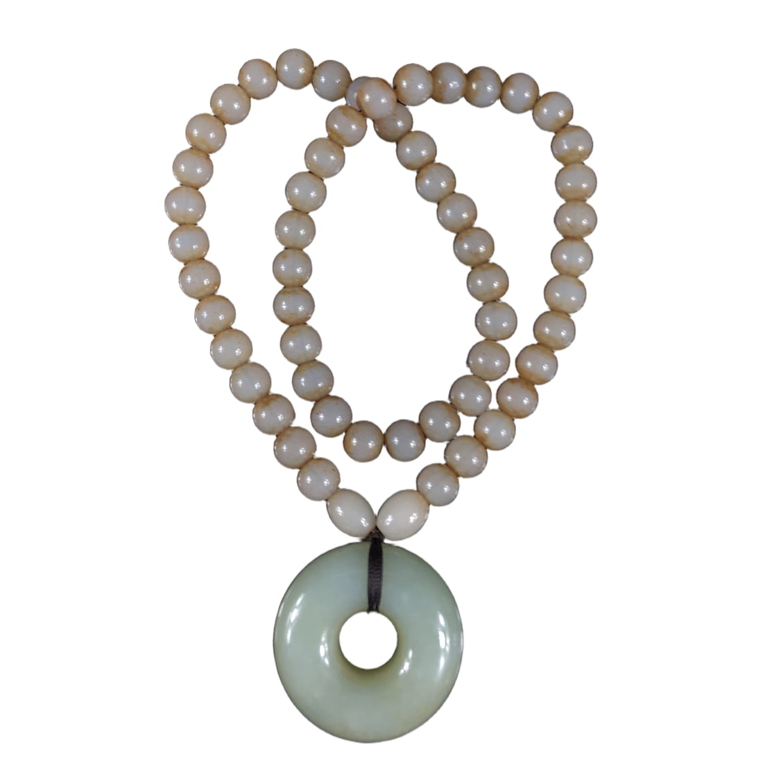 Hetian Jade Peace Buckle Pendant: Hetian jade safety buckle pendant, with a translucent and lustrous jade quality, showcasing the unique charm of Hetian jade. Its simple and generous design symbolizes peace and auspiciousness, suitabl