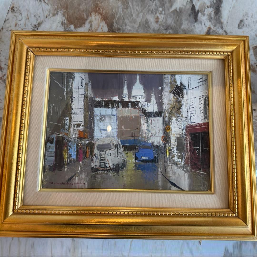 "La Martine Street" by Shigeyoshi Wakabayashi, oil painting with a gold frame: Title: "Rue de Lamartine" by Shigeyoshi Wakabayashi - Oil Painting with Gold Frame This street scene oil painting, titled "Rue de Lamartine," is elegantly framed in a gold frame. The artist is Shigeyo
