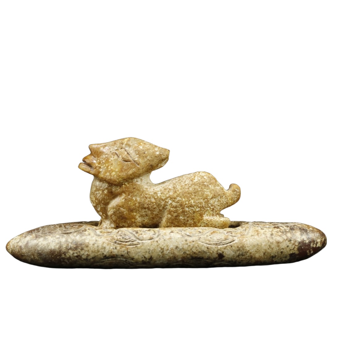 Hongshan Culture Human-faced Beast: This Hongshan Culture figurine features a human face on a beast, with a height of 6 cm, width of 15 cm, and weight of 292 grams. Its unique design combines elements of human and animal forms,