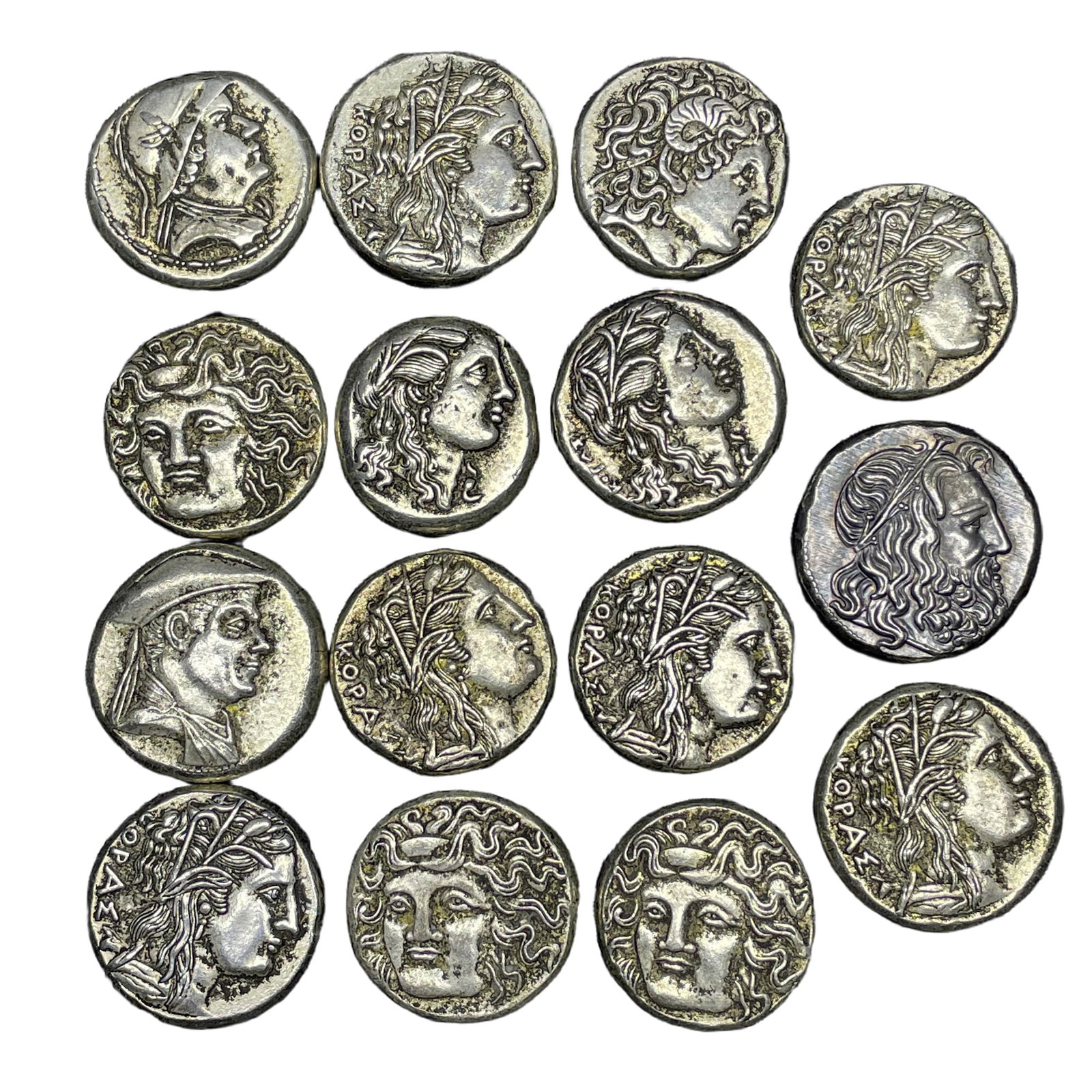 Collection of Roman Silver Coins: Collect 15 Roman silver coins, each measuring 3.5×0.52 cm, with a total weight of 455 grams. Freight: 1.International Freight: Foreign shipping charges are determined by destination. 2.Photos, descri