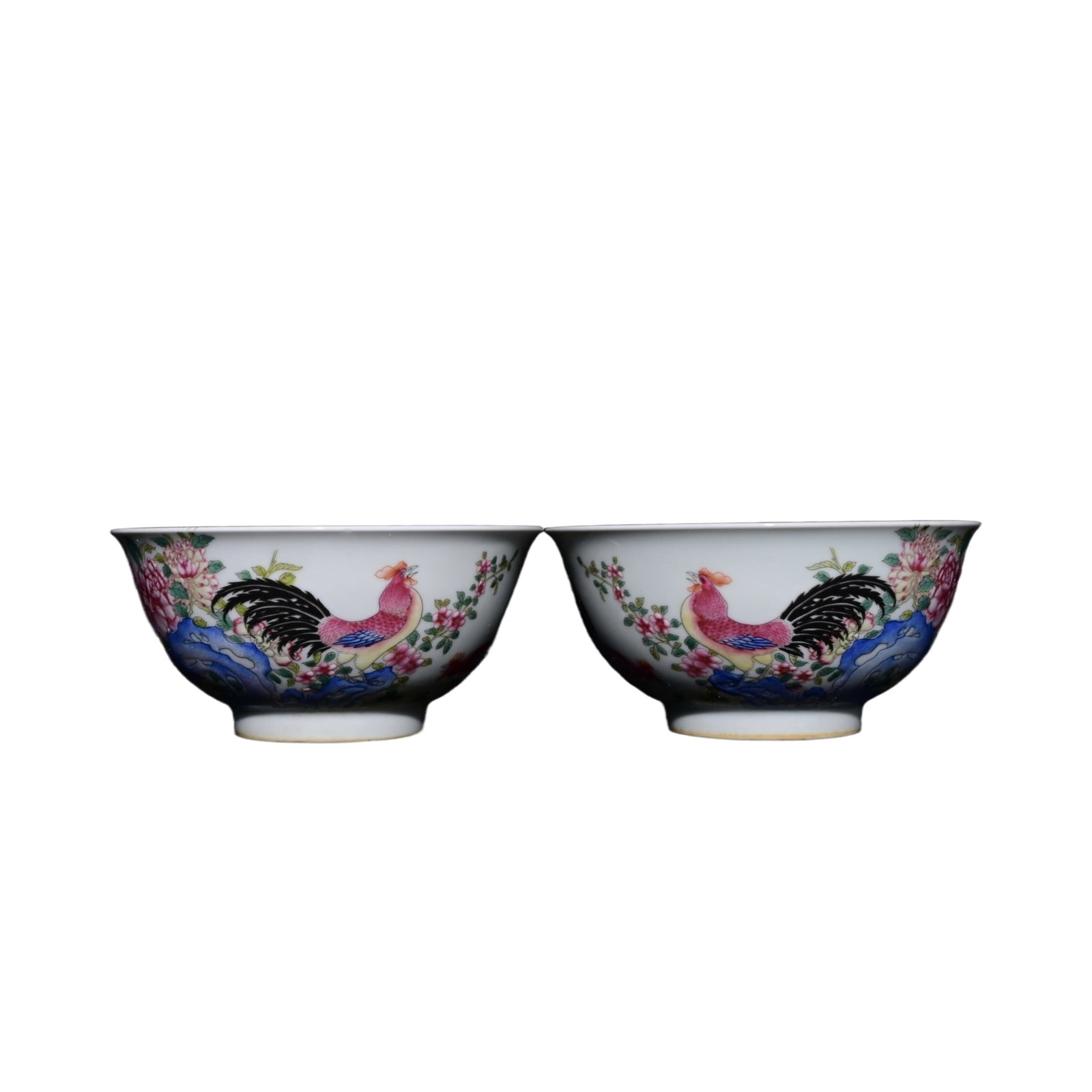 Qing Yongzheng Famille Rose Chicken Bowl: This Qing Dynasty powder enamel bowl, dating back to the Yongzheng period, measures 7.6 cm in height and 15.5 cm in diameter. It showcases a vivid chicken motif with exquisite powder enamel craftsmans