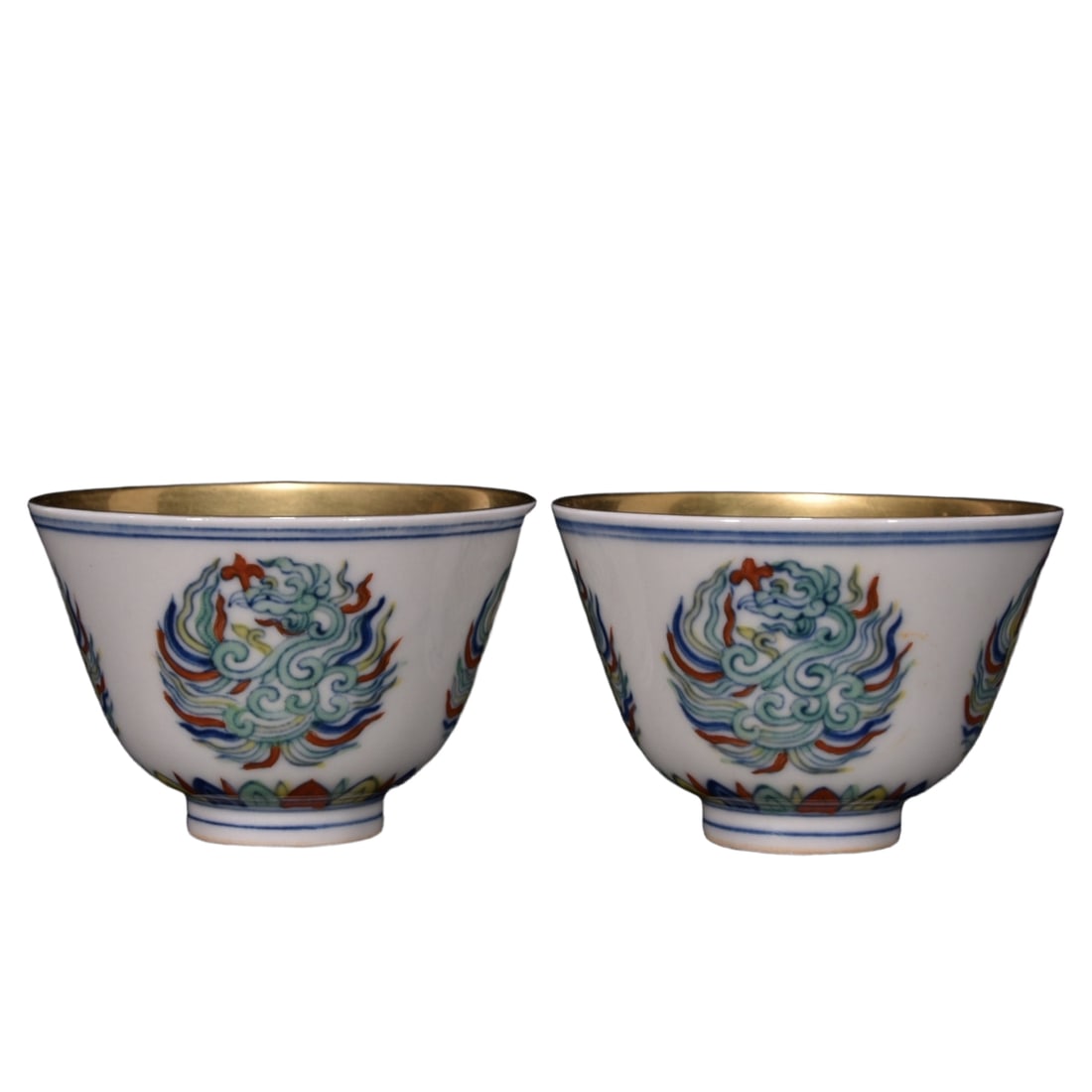 Ming Chenghua Red Body Doucai Phoenix Gilded Cup: This Ming Chenghua red-glazed Doucai cup with a gold phoenix design, is 5 cm tall and has a diameter of 7.5 cm, showcasing the brilliance of Ming Dynasty porcelain with exquisite craftsmanship. The ex