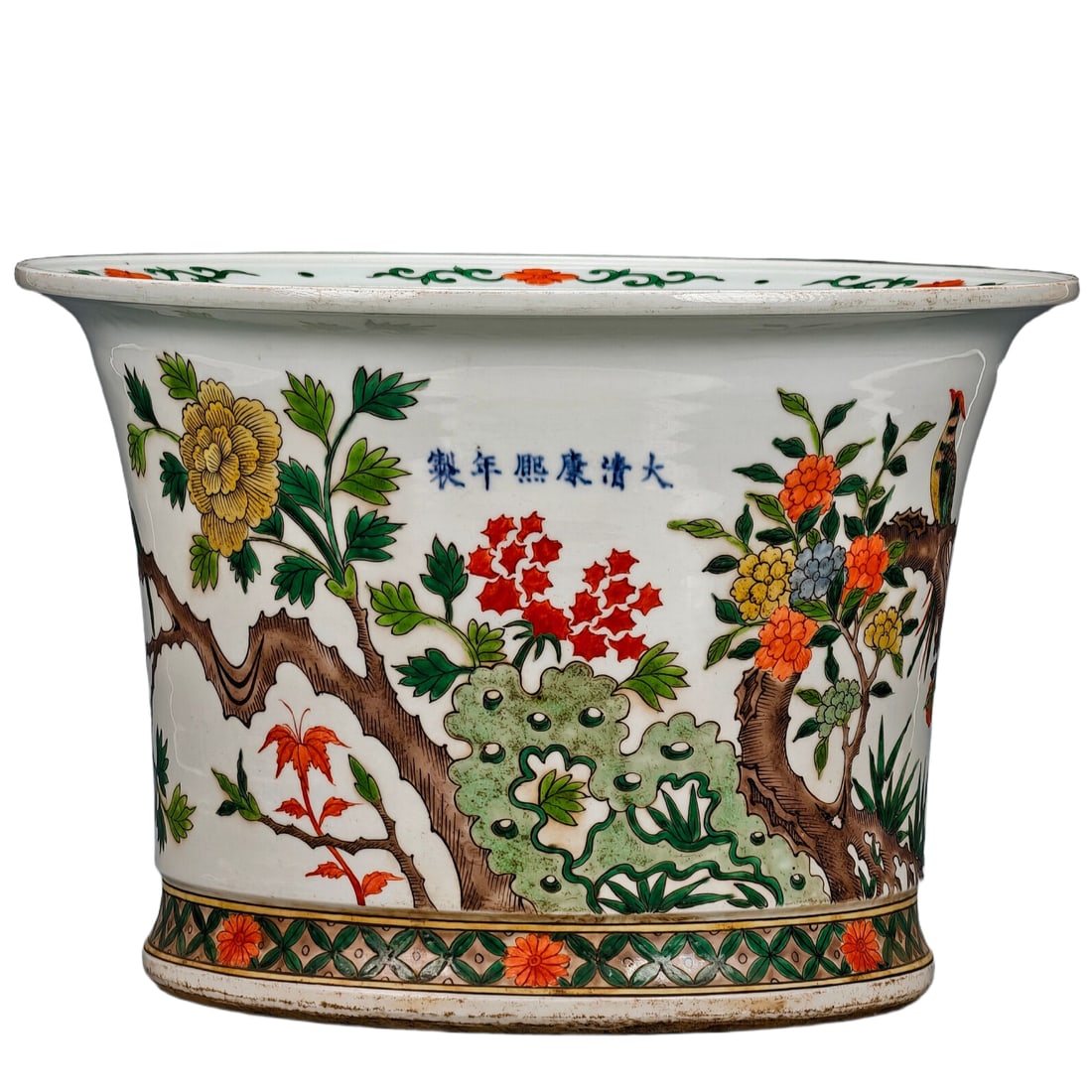 Qing Dynasty Kangxi Blue and White Polychrome Flower Pot: A Kangxi period Qing Dynasty blue and white famille-rose "Magpies on the Branch" patterned flower pot. This flower pot is exquisitely crafted, with colorful bird and flower patterns throughout. The fl