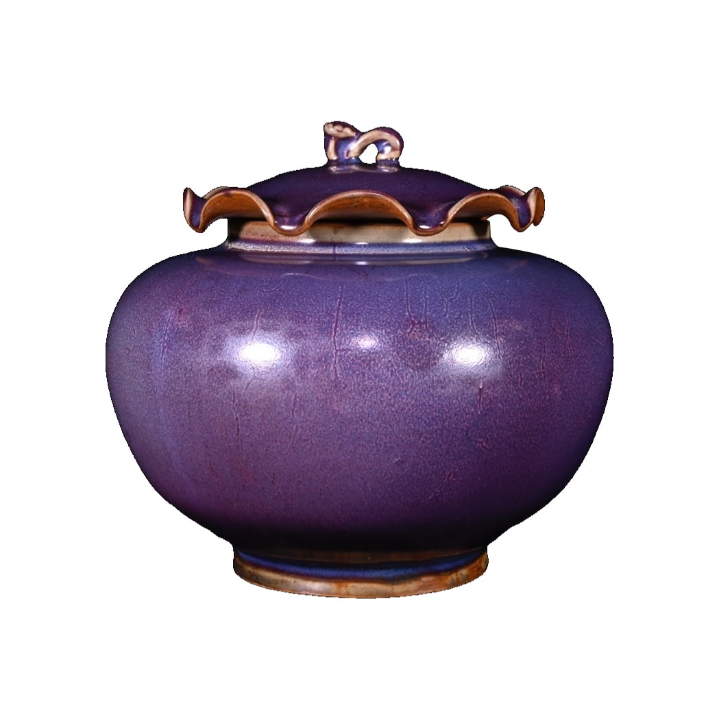 Song Dynasty Jun Kiln Rose Purple Glaze Lotus Leaf Ruyi Lid Jar: This Song Jun kiln rose purple glazed lotus leaf ruyi lidded jar, measuring 17×18 cm, reflects the essence of Song Dynasty art. Its purple glaze surface is dreamlike and elegant, exuding a sense of t