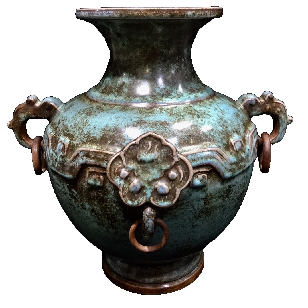 Song Dynasty Jun Kiln Blue Glaze Gold-Sprinkled Double Dragon Ruyi Vase: This Song Dynasty Jun ware vase with blue glaze and gold splashes, featuring a double dragon ruyi design, exhibits an ancient and enduring patina. The glaze is deep and layered, with gold splashes