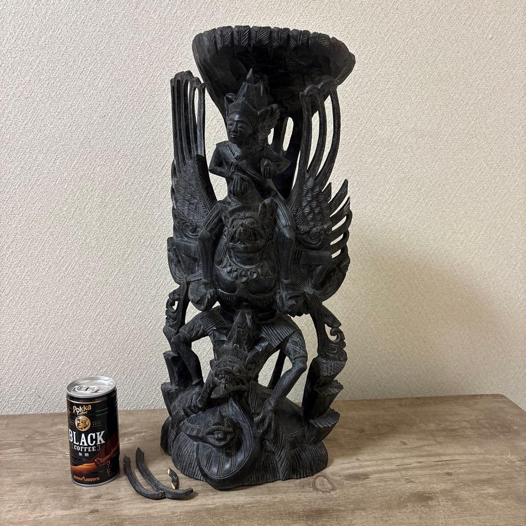 Hindu Deity Statue: Hindu Deity Statue, carved from striped ebony sourced from India and Bali, depicting the divine bird Garuda and the protector deity Vishnu. This piece is intended for those capable of restoring it.