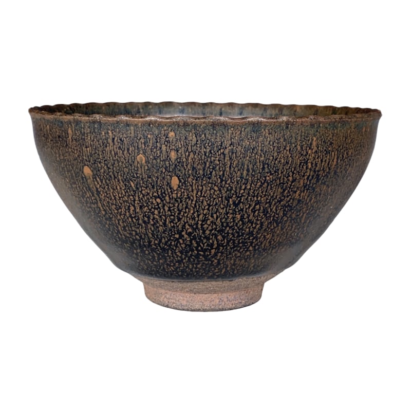 Song Jian Kiln Oil Spot Bowl: This Song Dynasty Jian ware oil spot tea bowl, with a height of 7.5 centimeters and a diameter of 13 centimeters, showcases unparalleled artistic value through its unique glaze technique. The oil spot