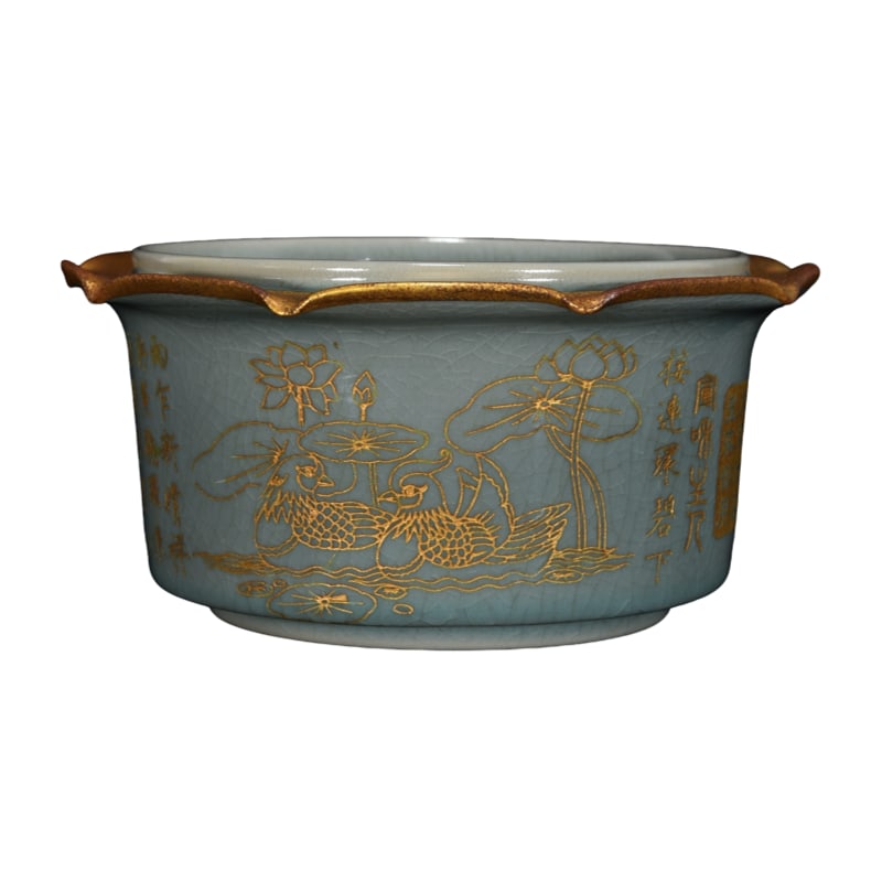 Song Ru Kiln Gilt Inscription Censer: This Ru kiln censer from the Song Dynasty, featuring a gilded rim and engraved design of mandarin ducks frolicking in water, stands 9 centimeters tall with a diameter of 19.5 centimeters. It