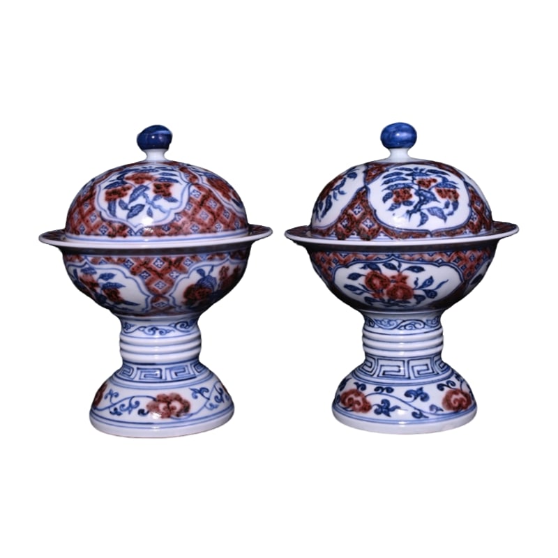 Ming Xuande Blue and Red Glazed Fruit Pattern Dou: This Ming Dynasty Xuande-marked blue and white with underglaze red gourd-shaped vessel, measuring 18×14 cm, showcases the exceptional craftsmanship of Ming Dynasty ceramics. The combination of blue
