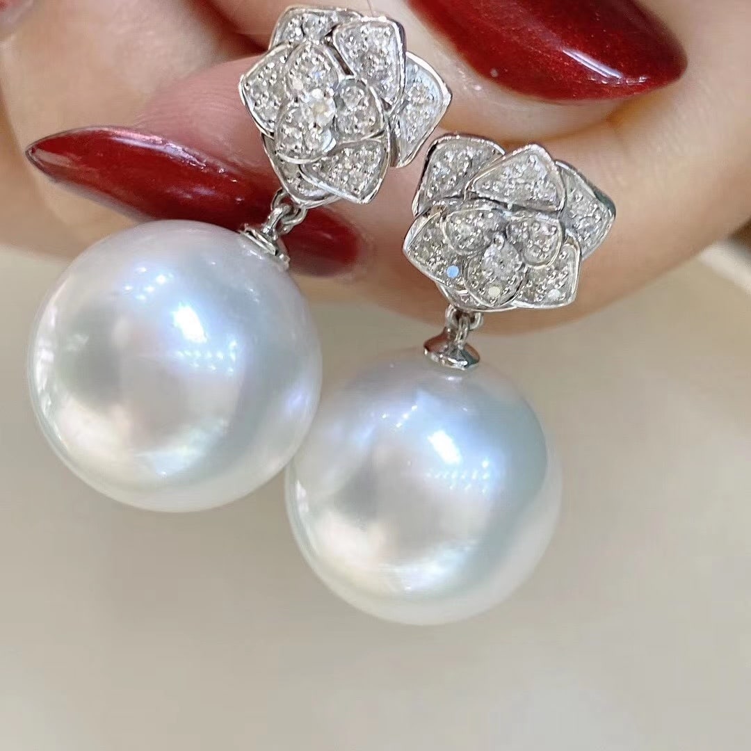 925 Sterling Silver Natural Pearl Earrings: These earrings are meticulously set in 925 sterling silver, exuding a luxurious cool white luster. displaying a slightly flawed perfect round shape with a rich golden strong light. Specifications: Pea