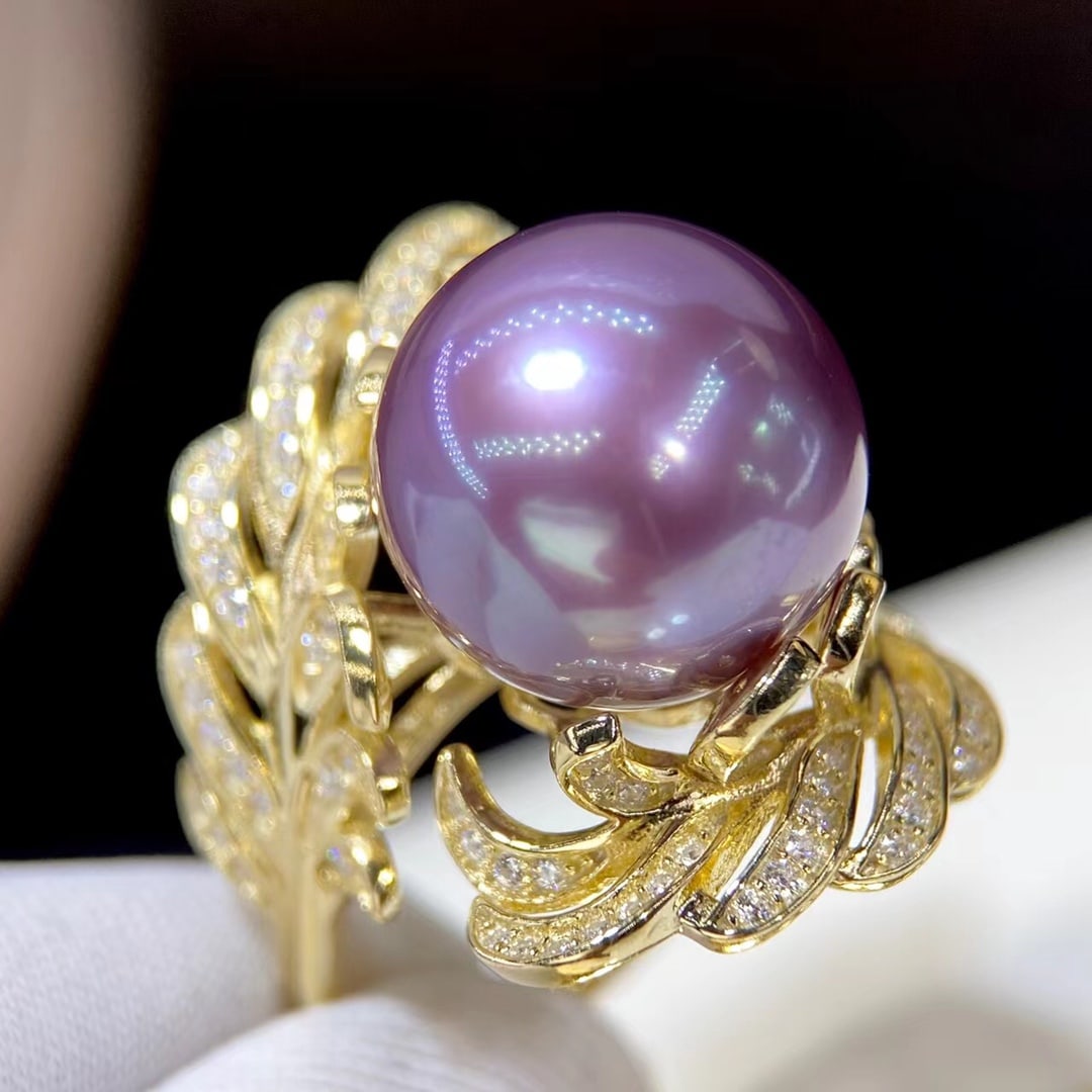 S925 Sterling Silver Natural Purple Pearl Ring: This ring features a natural purple pearl with rich gold and cool white luster. The pearl has a large diameter of 12-13mm, showcasing a perfect round shape with minimal blemishes. The S925 silver gilt