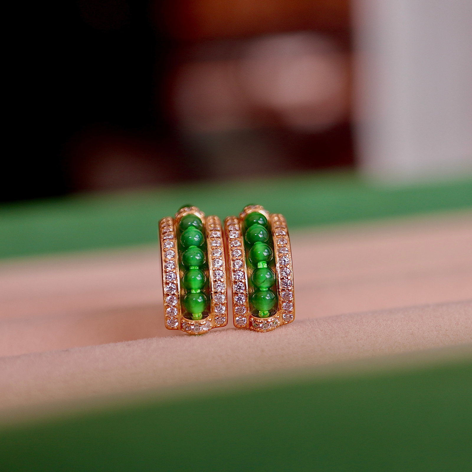 S925 Silver Natural Jade Earrings: These earrings feature natural jade with an imperial green hue, complemented by S925 silver and 18K gold plating. The combination of rich gold and cool white, along with the large diameter design and 